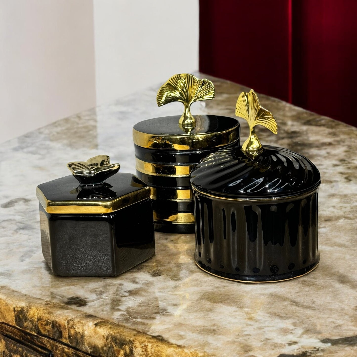 Black and Gold Striped Decorative Jar with Leaf Handle